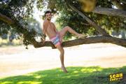 Sexy-newbie-bearded-muscle-stud-Sean-Cody-Griffin-strips-out-of-swim-shorts-wanking-massive-thick-dick-4-gay-porn-pics