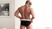 Huge-muscle-hunk-Thomas-Friedl-strips-out-of-tight-sexy-undies-stroking-big-thick-cock-4-gay-porn-pics